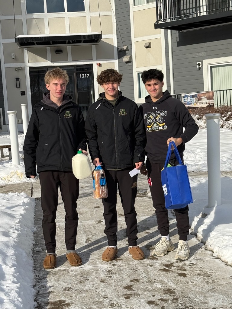 Student volunteers delivering groceries